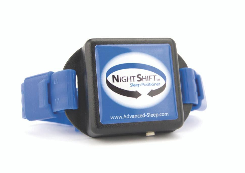 Advanced Brain Monitoring NightShift sleep positioner, a wearable device with a blue strap and a digital display screen showing the NightShift logo.