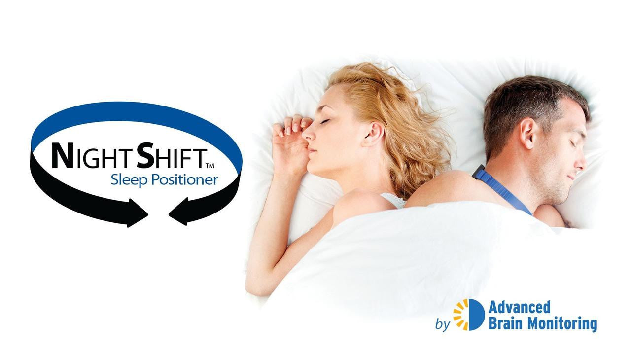 Advanced Brain Monitoring NightShift Sleep Positioner, image showing a woman and a man sleeping peacefully in bed with the product logo.
