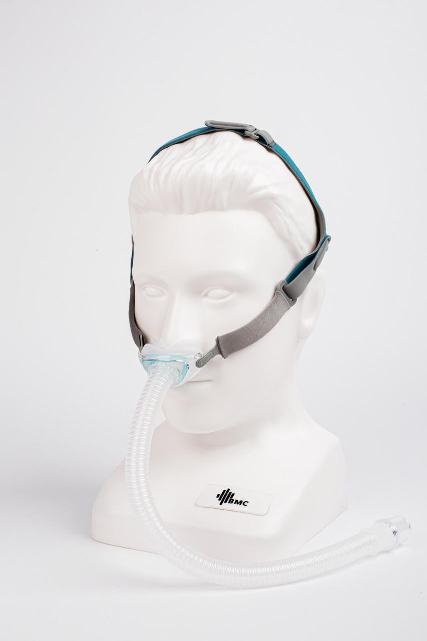 BMC P6 Nasal Pillows CPAP Mask Fitpack with all sizes included, displayed on a white mannequin head, featuring a nasal pillow mask and adjustable headgear for sleep apnea therapy.