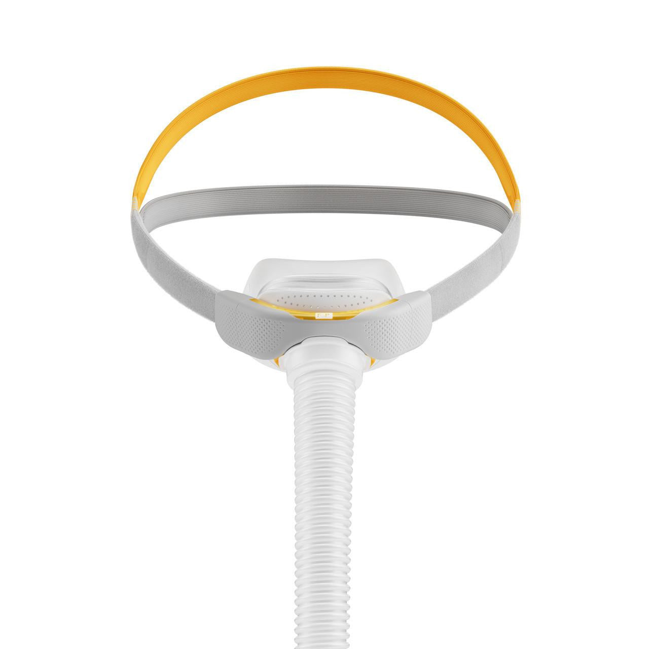 Fisher and Paykel Healthcare Fisher and Paykel Solo Pillows Interface, medical breathing mask with adjustable head strap and hose connection for respiratory support.
