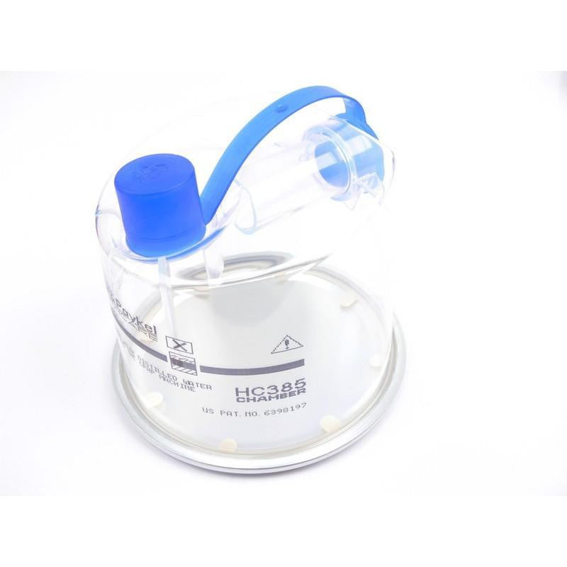Fisher and Paykel Healthcare Standard Chamber for HC220/230, clear medical respiratory chamber with blue cap and connection nozzle.
