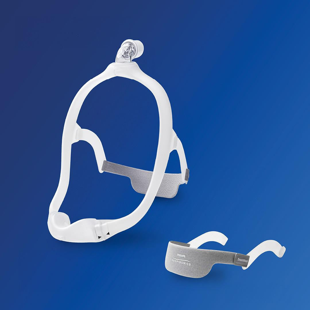 Philips Respironics Philips DreamWear Nasal Cushion Mask FitPack, a medical device consisting of a nasal cushion mask with adjustable straps and a soft nasal cushion for comfortable CPAP therapy.