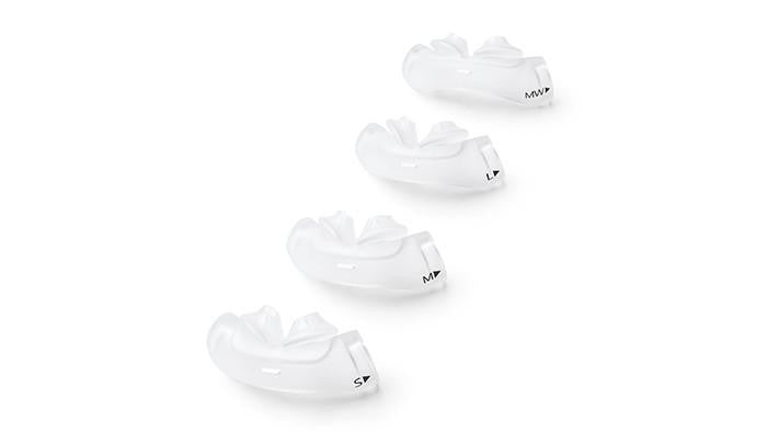 Philips Respironics Philips DreamWear Silicone Pillows CPAP mask, set of four white silicone nasal pillows with small, medium, large, and extra-large sizes.