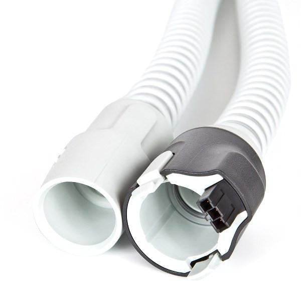 Philips Respironics System One 60 Series heated tube, disconnected, medical breathing therapy equipment.