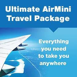 Resmed AirMini Ultimate Travel Pack + Battery, compact travel respiratory device with accessories on a blue background.