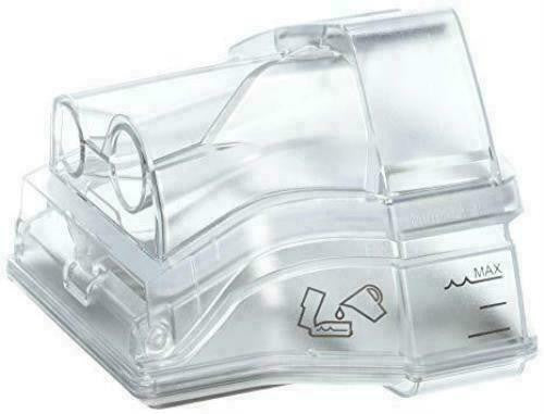Resmed Airsense 10 HumidAir Chamber, clear plastic humidifier chamber with water level markings and airflow indicator.