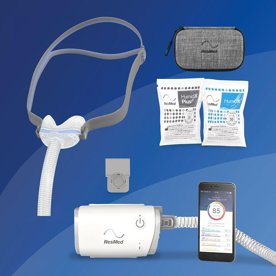 ResMed AirMini - N30 Starter kit + Deluxe Bag, including portable CPAP machine, mask, humidifier, storage pouch, and smartphone app connectivity for sleep therapy.