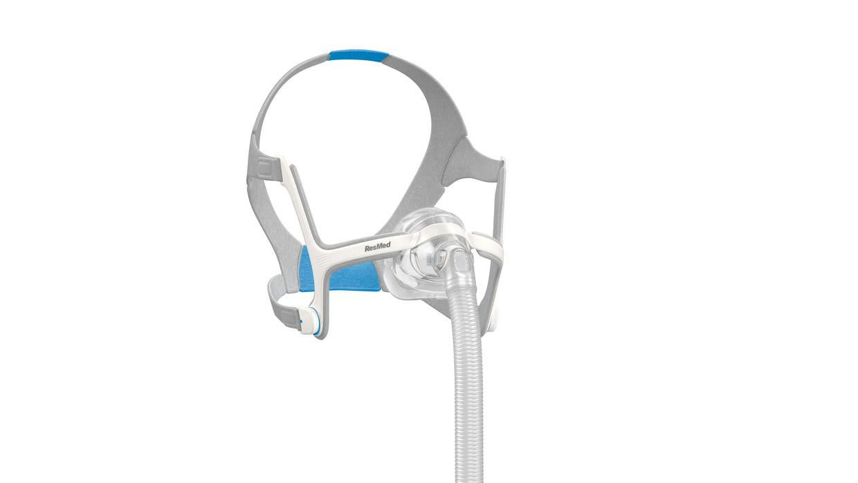 Resmed AirTouch N20 starter kit, sleep apnea mask with adjustable headgear and flexible tubing for CPAP therapy.
